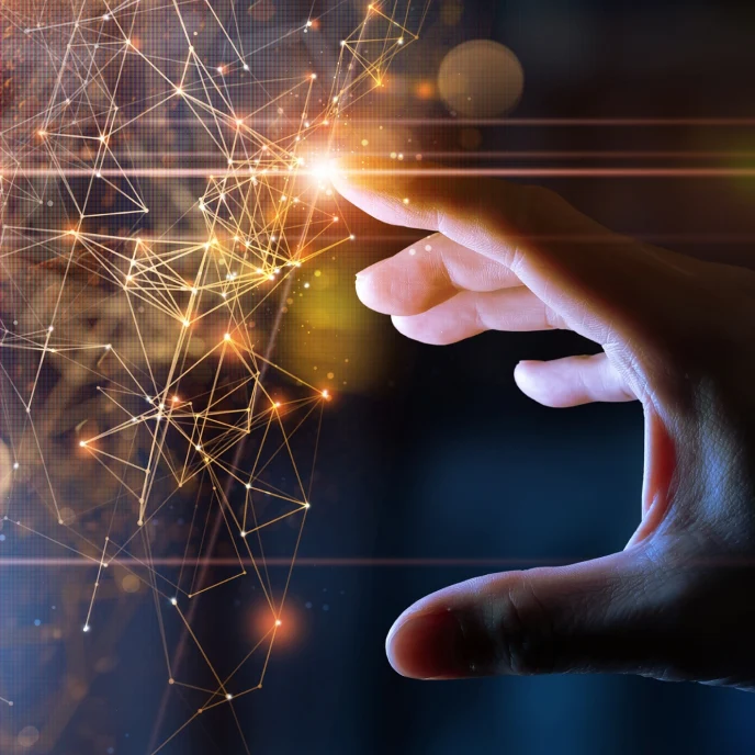 Mano interactuando con puntos de conexión digitales, ilustrando la innovación en el sector digital